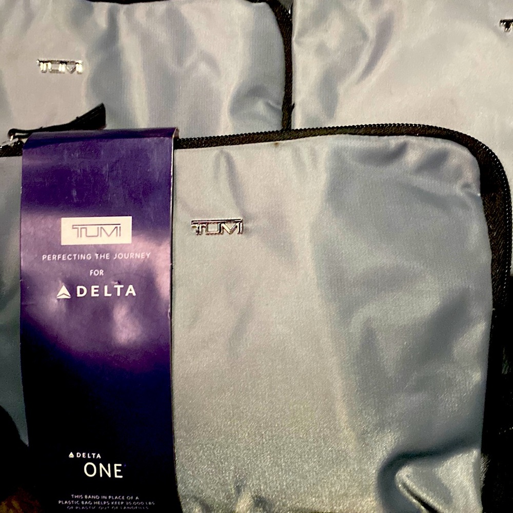 TUMI travel amenity kit 2022 first class delta brand new sealed. Lot of ten